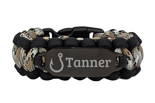 Black and camouflage-patterned bracelet with a name on a black ID tag on a white background
