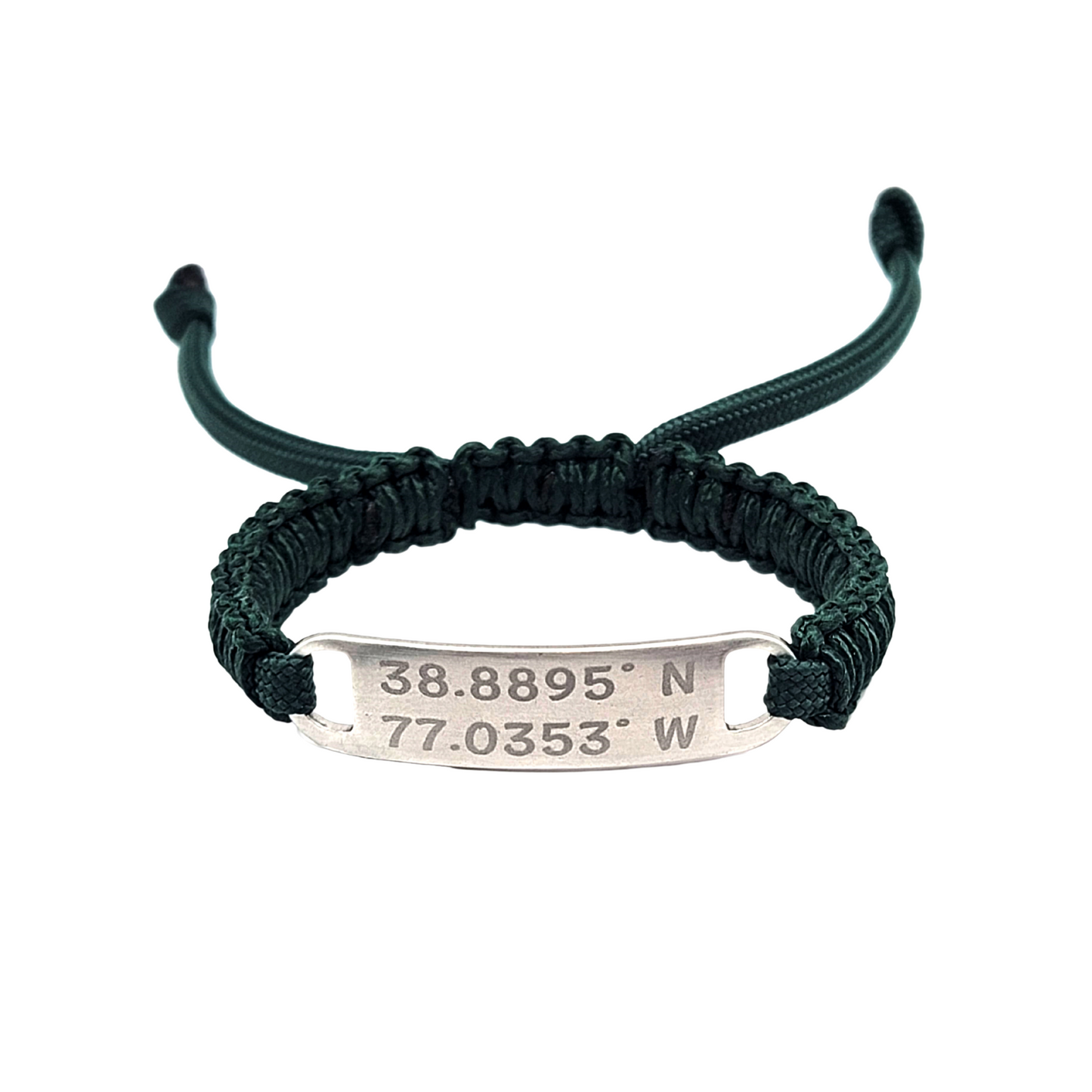 Front view of the green paracord bracelet displaying engraved coordinates on the polished metallic tag.