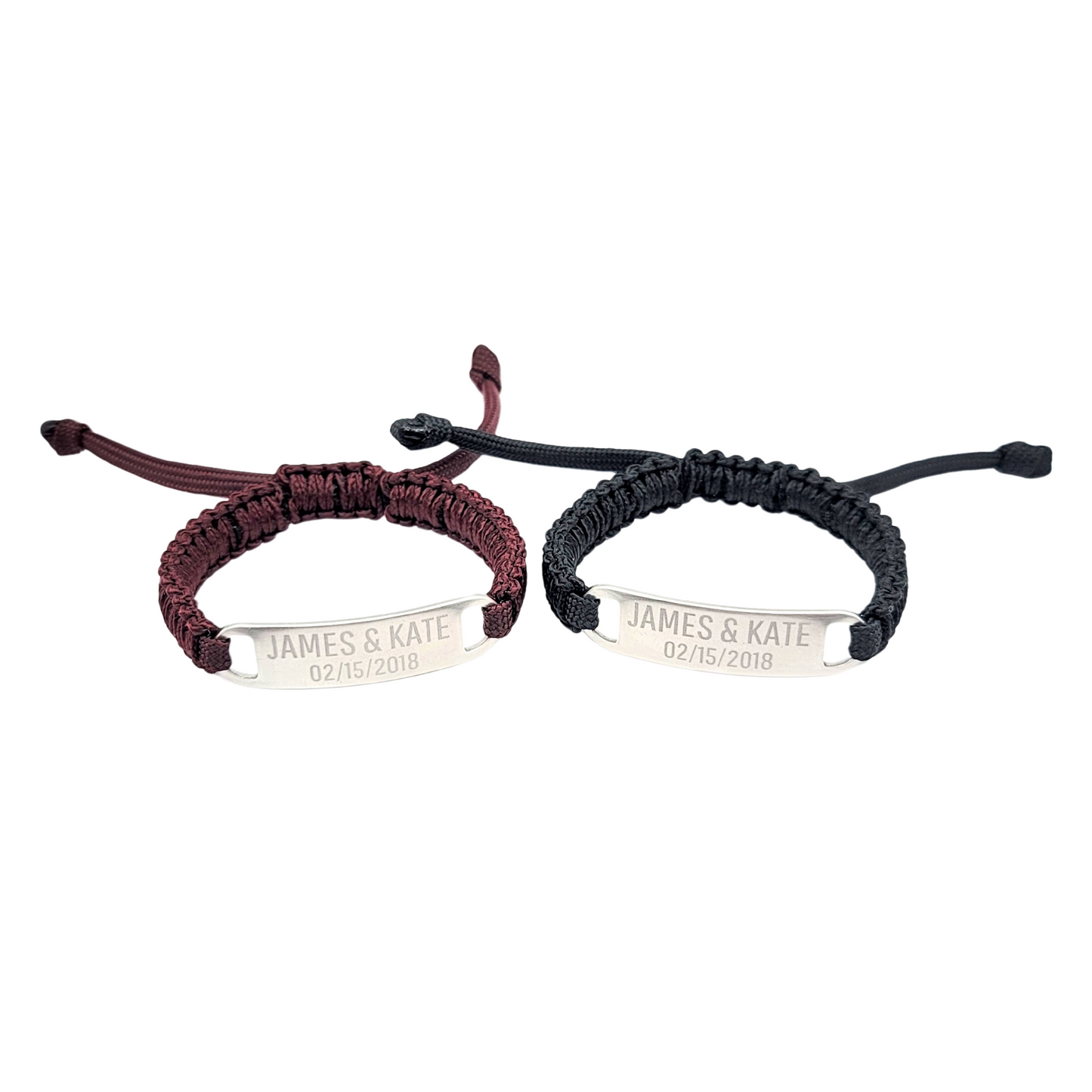 A set of two adjustable micro paracord bracelets featuring a maroon and black cord design, each with a polished stainless steel plate engraved with "James & Kate 02/15/2018." The bracelets are shown on a white background with detailed cord texture.