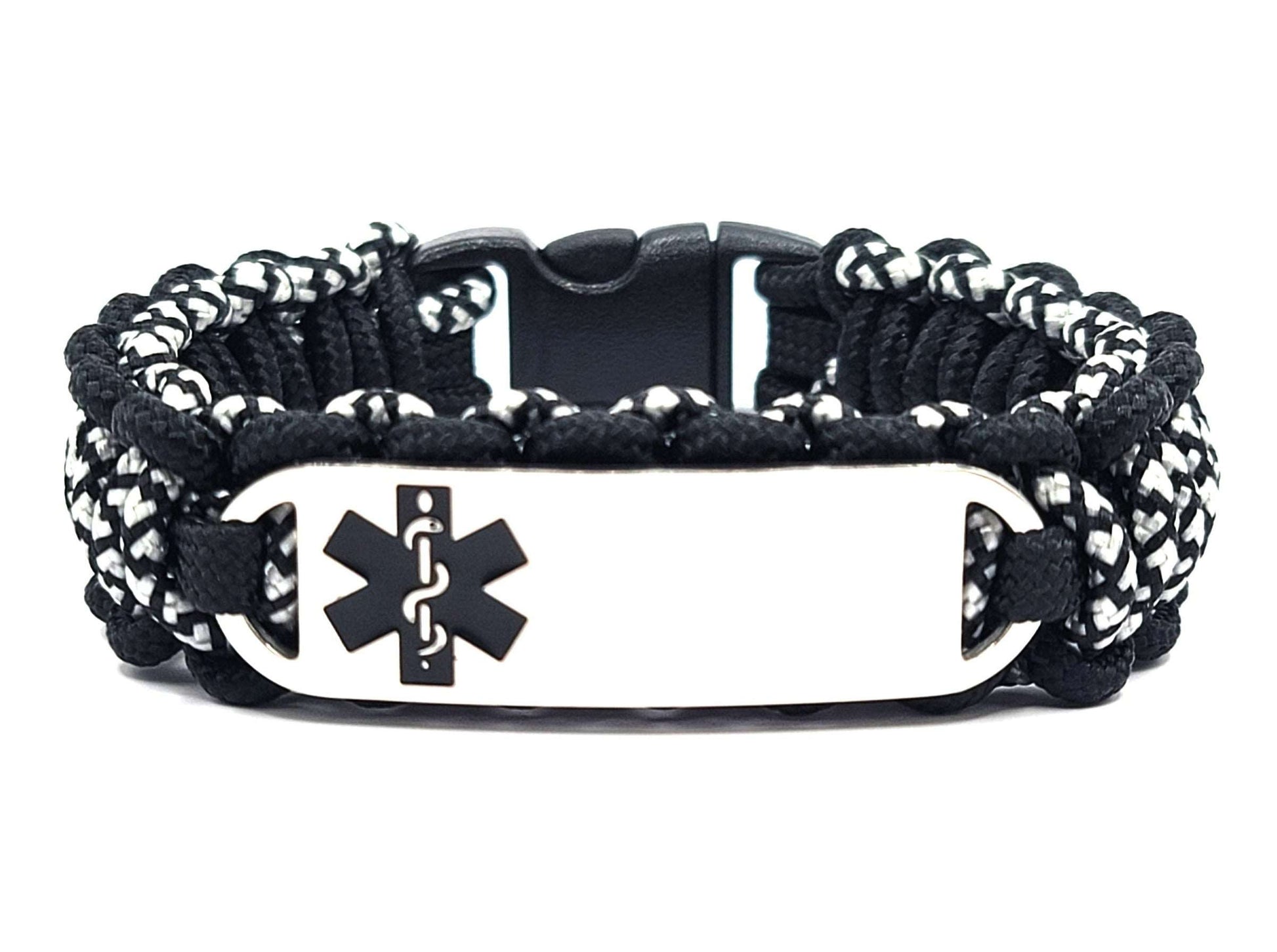 Black and silver, thin, 275 paracord medical alert bracelet with a silver colored, stainless steel ID tag with an enameled black medical symbol, displayed on a white background.