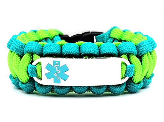 Teal and neon green paracord medical alert bracelet with a silver colored, stainless steel ID tag with an enameled teal medical symbol, displayed on a white background.
