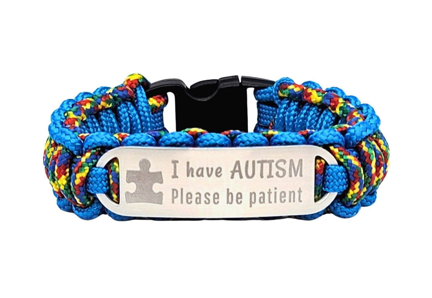 Colorful thin 275 paracord ID bracelet with a silver, stainless steel ID tag engraved with I have autism, please be patient and a puzzle piece, displayed on a white background.