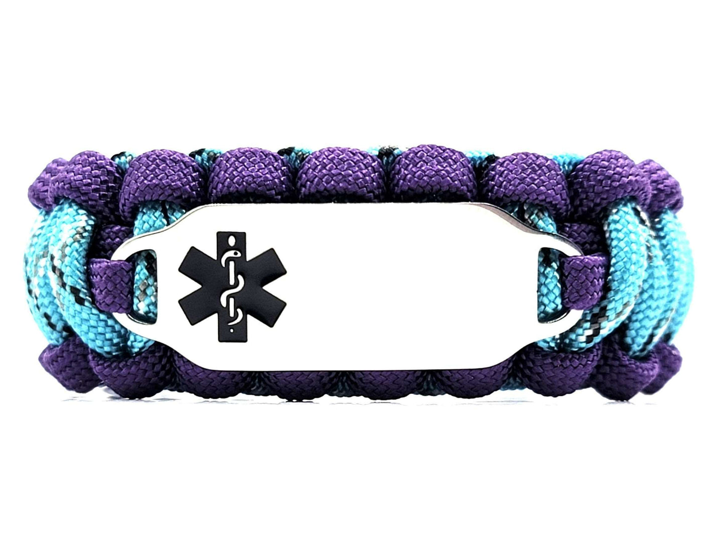 Purple, turquoise, and black paracord medical alert bracelet with a silver colored, stainless steel ID tag with an enameled black medical symbol, displayed on a white background.