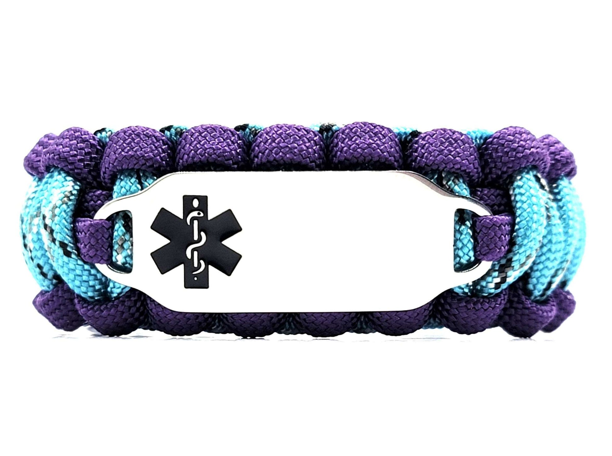 Purple, turquoise, and black paracord medical alert bracelet with a silver colored, stainless steel ID tag with an enameled black medical symbol, displayed on a white background.
