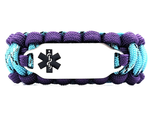 Purple, turquoise, and black paracord medical alert bracelet with a silver colored, stainless steel ID tag with an enameled black medical symbol, displayed on a white background.