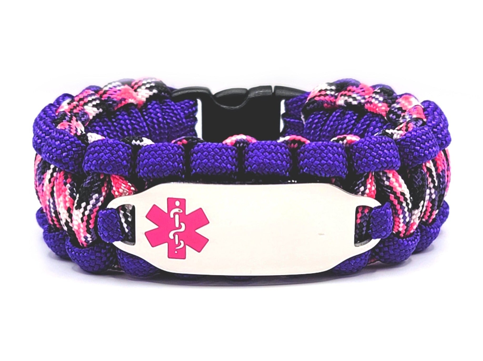 Purple, pink, white, and black paracord medical alert bracelet with a silver colored, stainless steel ID tag with an enameled pink medical symbol, displayed on a white background.