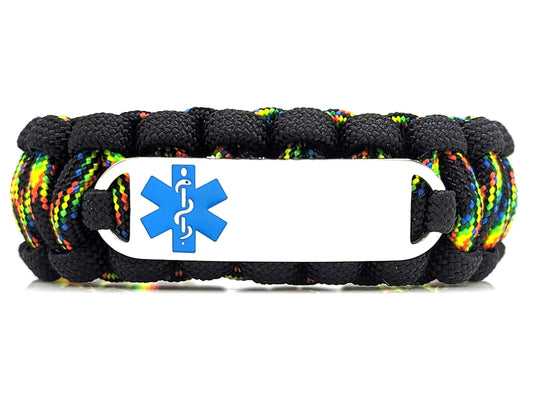 Black and galaxy colored paracord medical alert bracelet with a silver colored, stainless steel ID tag with an enameled blue medical symbol, displayed on a white background.