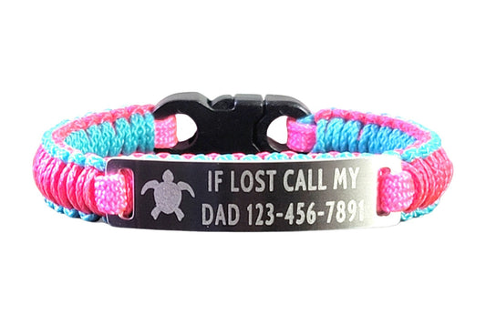 A teal and pink micro cord bracelet with an engraved metal tag that says If Lost Call My Dad followed by a phone number displayed against a plain white background.