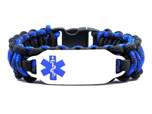 Blue & Black, thin, 275 paracord medical alert bracelet with a silver colored, stainless steel ID tag with an enameled blue medical symbol, displayed on a white background.