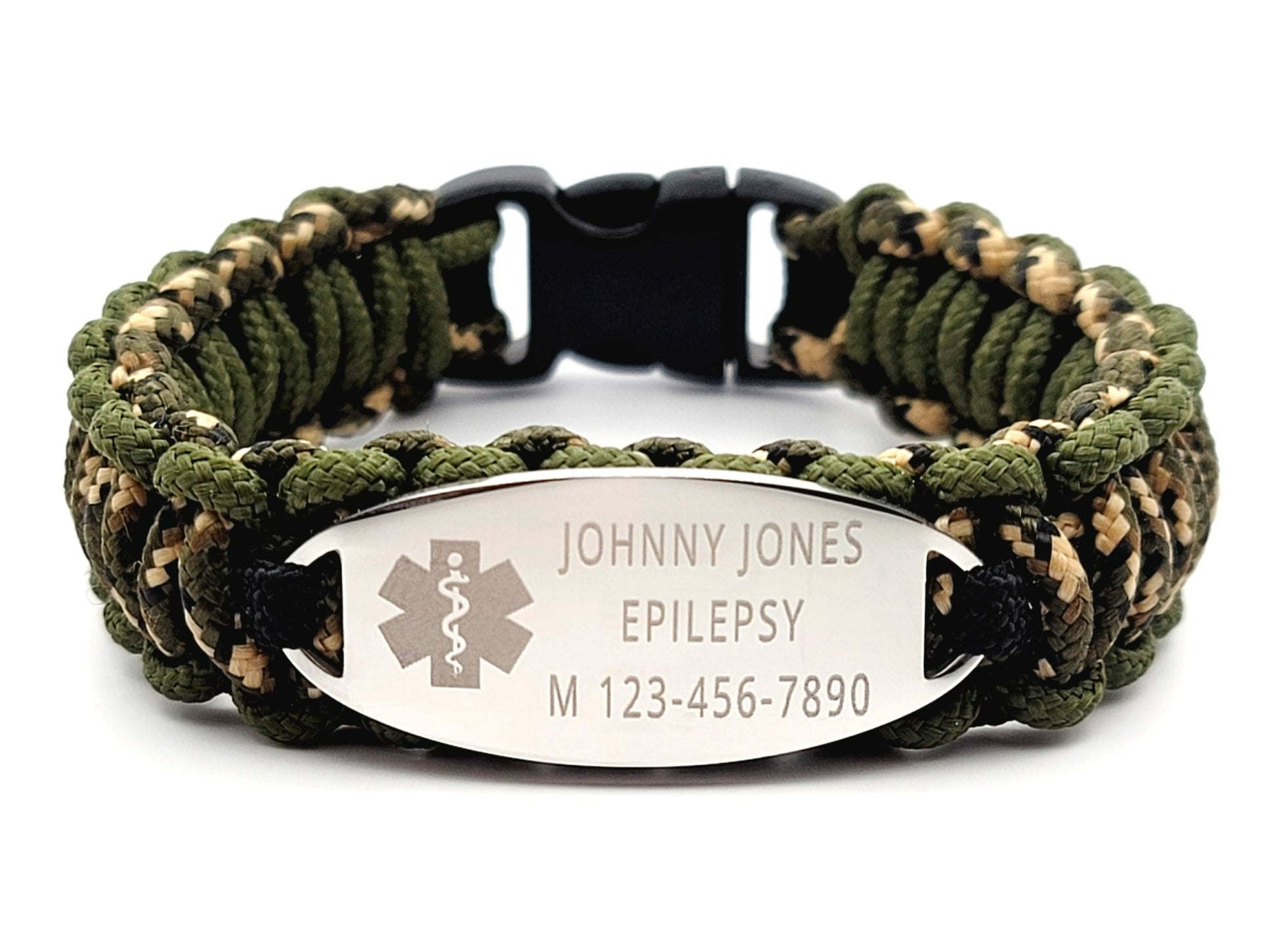 Camouflage thin 275 paracord ID bracelet with a silver, stainless steel ID tag engraved with medical information and a medical symbol, displayed on a white background.