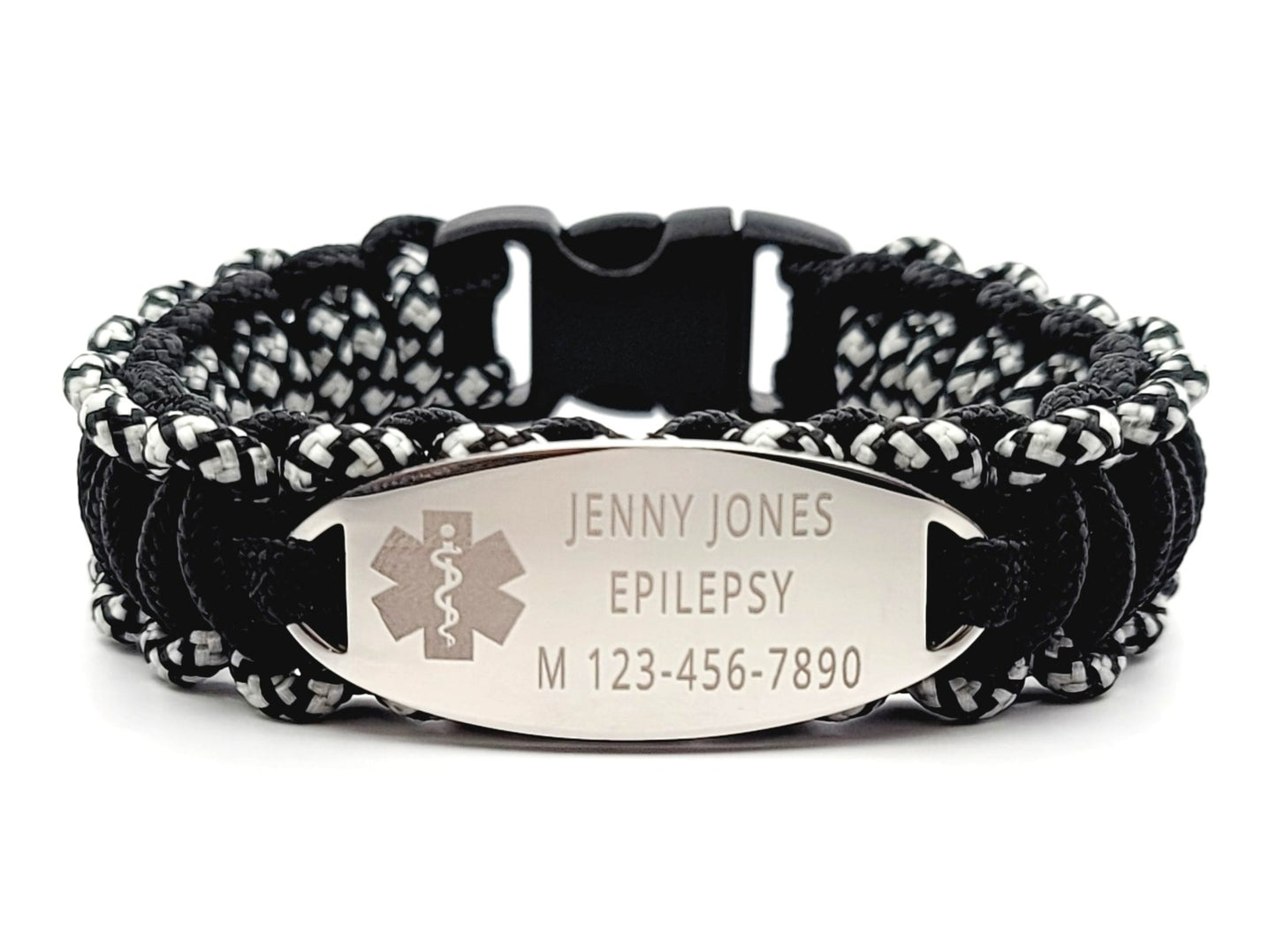 Black & Silver thin 275 paracord ID bracelet with a silver, stainless steel ID tag engraved with medical information and a medical symbol, displayed on a white background.