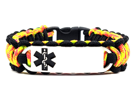 Yellow, pink, & black thin, 275 paracord medical alert bracelet with a silver colored, stainless steel ID tag with an enameled black medical symbol, displayed on a white background.