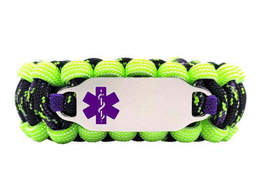 Black, lime green, and purple paracord medical alert bracelet with a silver colored, stainless steel ID tag with an enameled purple medical symbol, displayed on a white background.