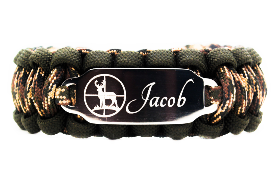 Camouflage paracord ID bracelet with a silver, stainless steel ID tag engraved with the name Jacob and a deer silhouette, displayed on a white background.